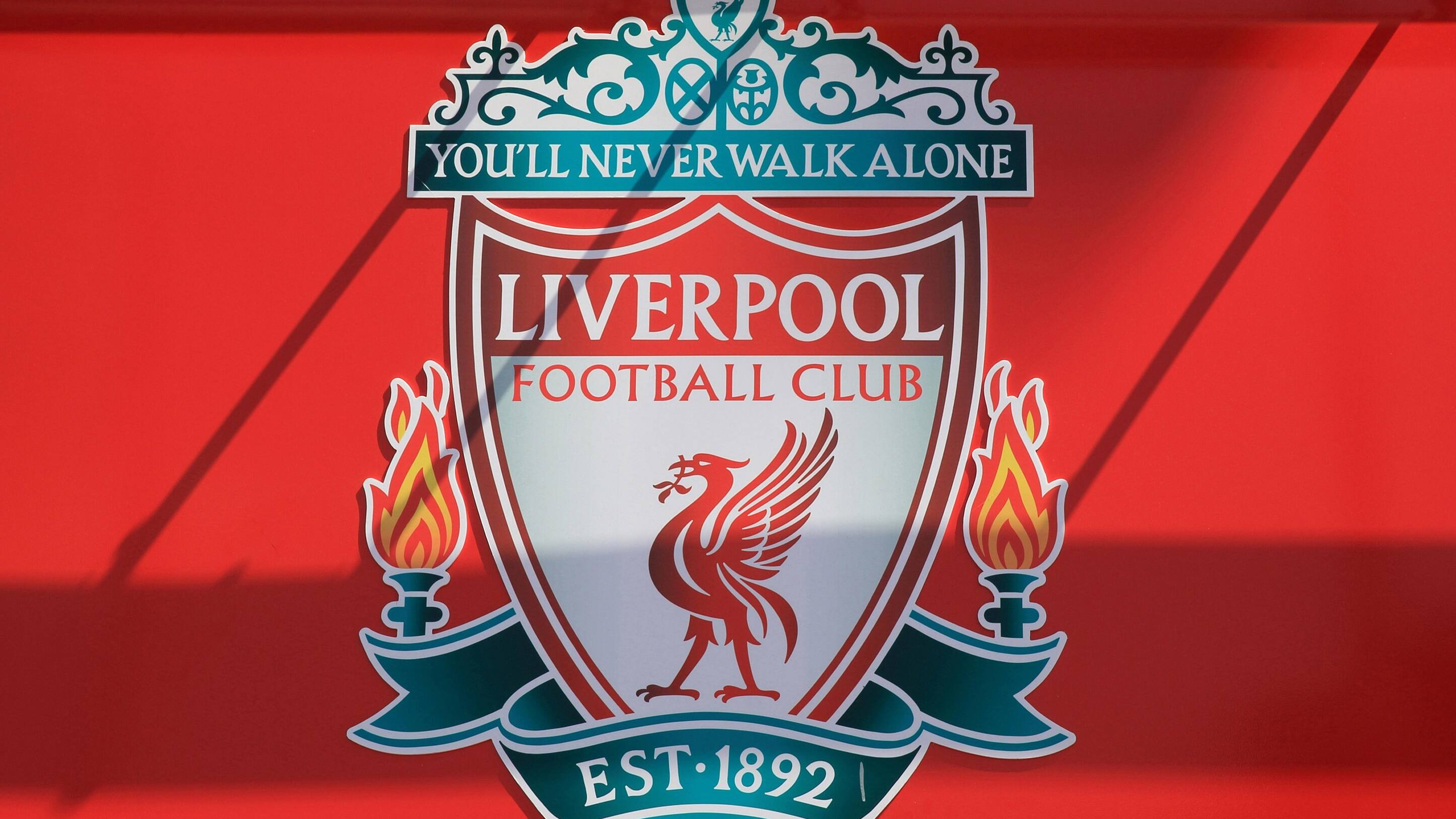 The Liverpool football club emblem, You'll Never Walk Alone, at Anfield football stadium, Merseyside, NW England, UK - Image ID: E4CHEN